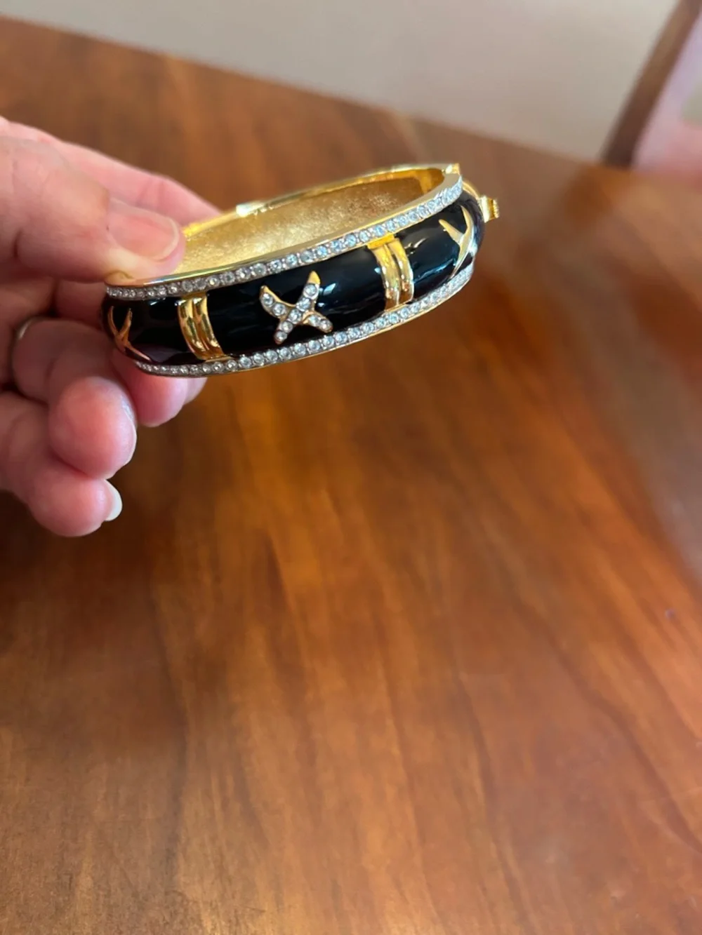 Gold-Tone Black Enamel X Accent Bangle Bracelet